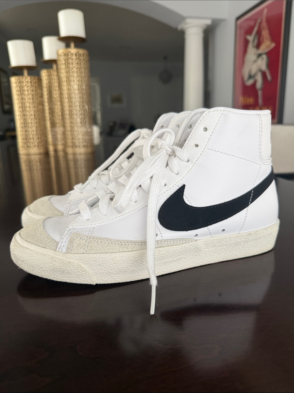 Nike White High-Top Sneakers with Black Swoosh